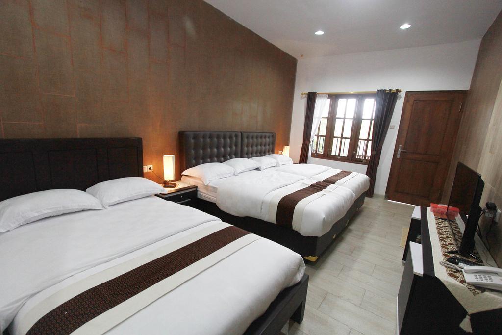 Отель Beone House Jogja Kalasan Номер фото